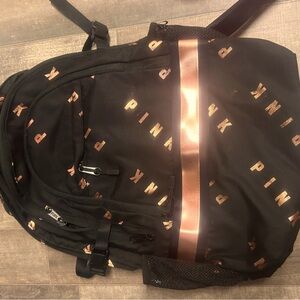 Backpack with pink logo